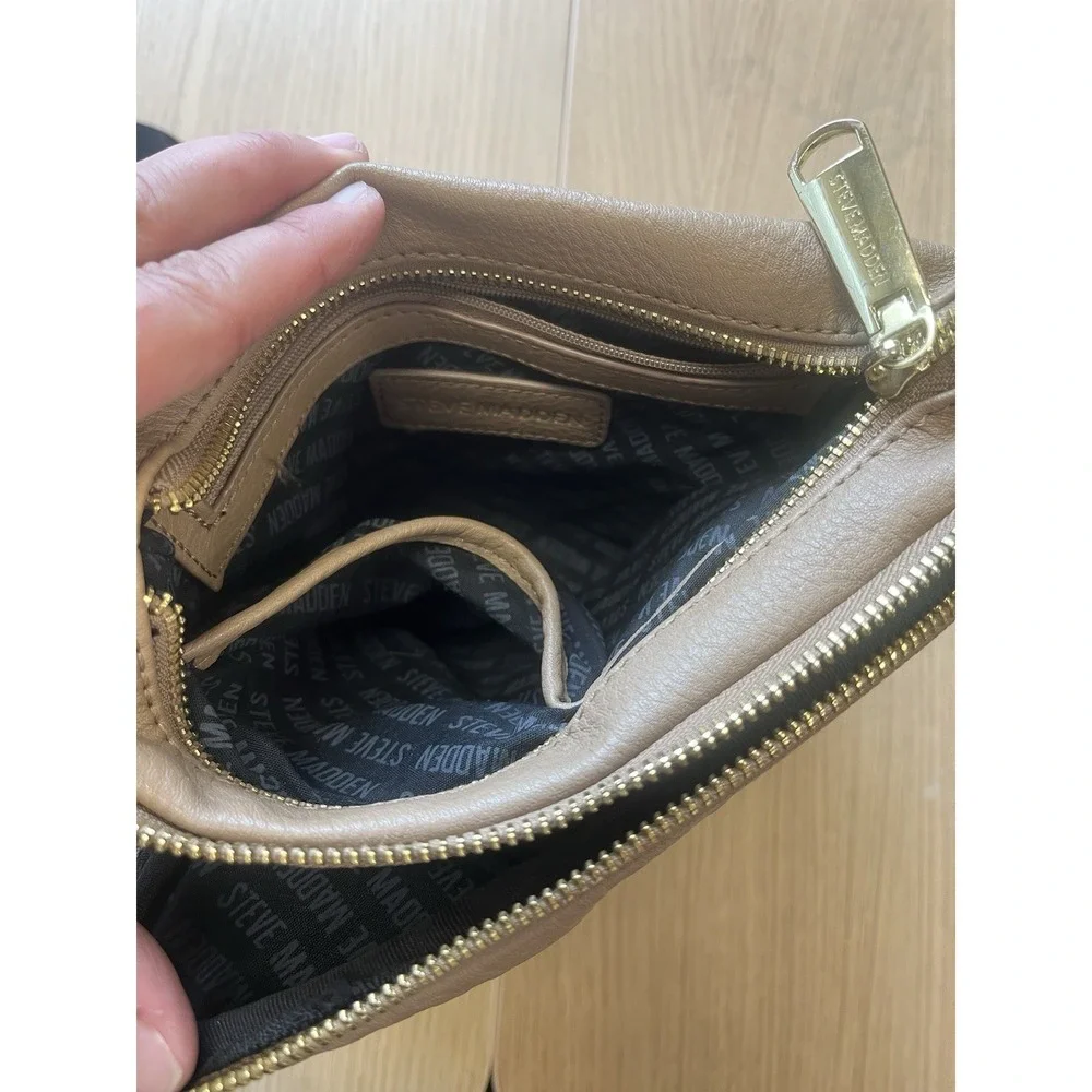 Steve Madden Taupe Embossed Logo Crossbody Bag Tassel Black Strap Gold Hardware